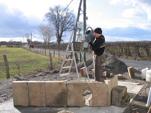 39 drilling the cement base to fix the stones